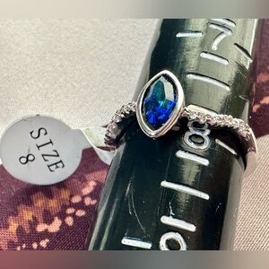 Fragrant Jewels Silver Ring with Iridescent Blue Stone